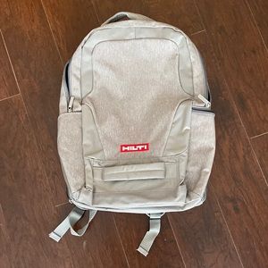 Hilti branded Grey backpack with laptop sleeve, usb connection, luggage strap